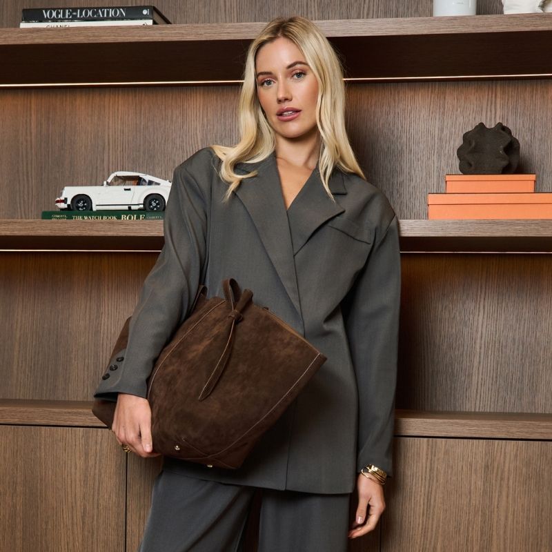 complete your look with our latest bags, shop now >